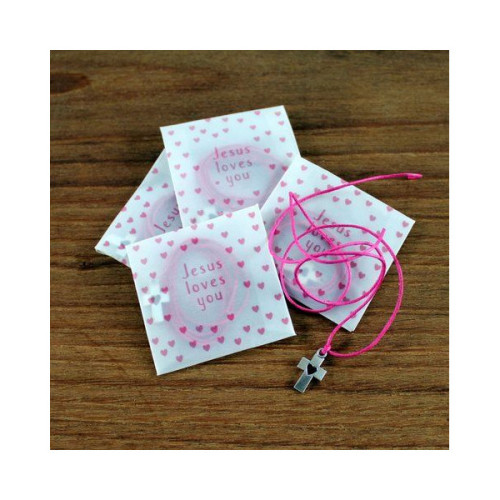 Croix et lien en coton rose