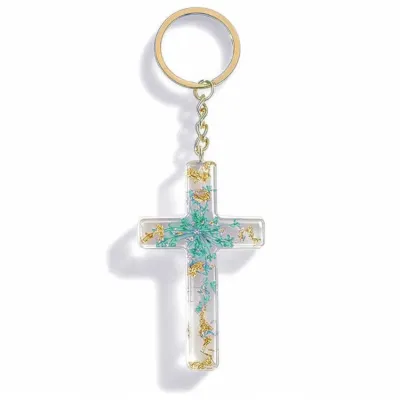 Porte clé croix avec inclusions de fleurs - turquoise