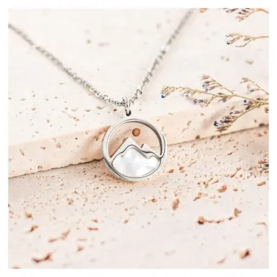Collier avec pendentif graine de moutarde en acier couleur argent